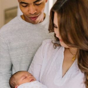 mom dad and infant